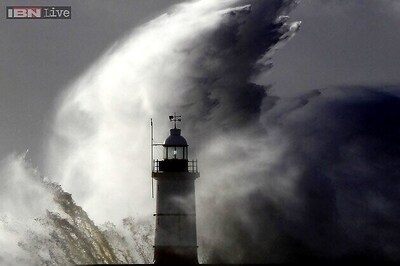 UK storm: St Jude batters southern Britain, hitting flights, trains