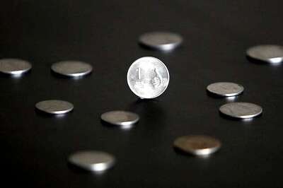 Rupee rebounds to 59 level; up 80 paise Vs dollar