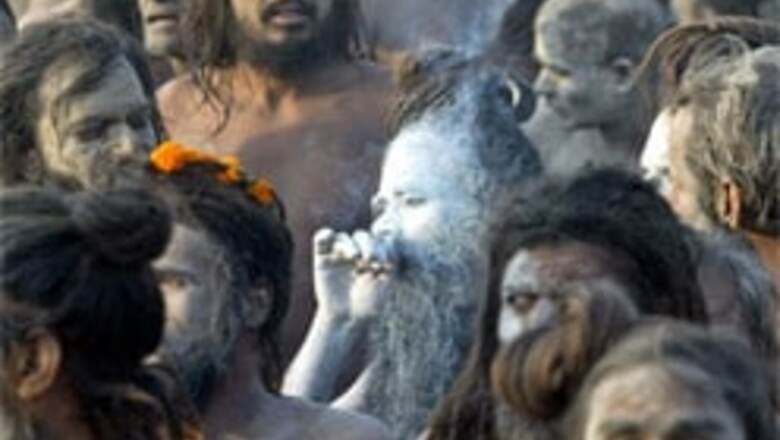 Naga sadhus rough up foreign journos