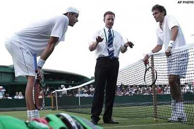 Longest Wimbledon match ends after 11 hours