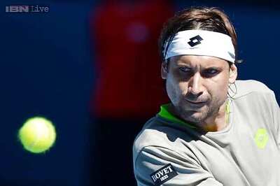 David Ferrer advances, John Isner out in Mexico