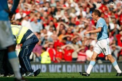 Footballer Bellamy faces ban over altercation with fan