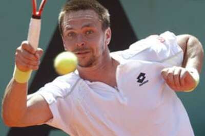 Soderling strolls into French Open semis, Murray out