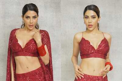 Sexy! Nikki Tamboli Flaunts Ample Cleavage In Red Shimmery Blouse; Hot Video Goes Viral