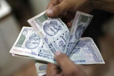 Rupee touches 65 per dollar