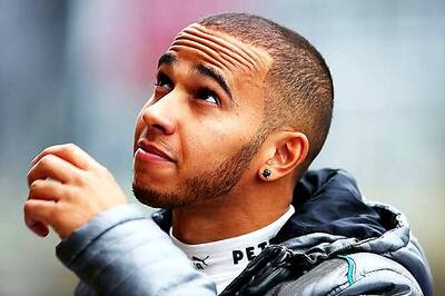 Mercedes' Hamilton grabs pole position at Silverstone