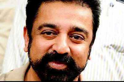 Versatile Kamal Haasan turns make-up artist for Prakash Raj and Trisha on the sets of  'Thoongaavanam'