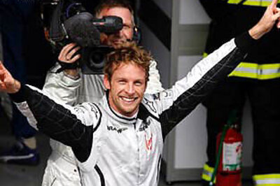 Button gives Brawn GP's victory parade a miss