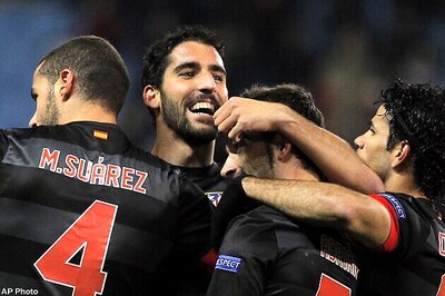 Atletico through in Europa, setback for Liverpool