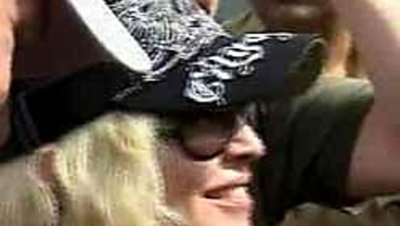 In Pics: Material girl Madonna on a trip to slums