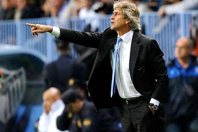 Malaga beat 10-man Racing 3-0 to go third