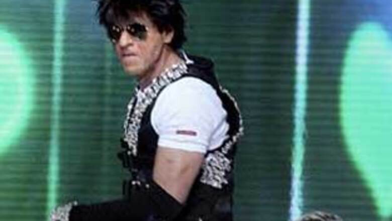 SRK pulls out his shirt, flaunt abs on TV show