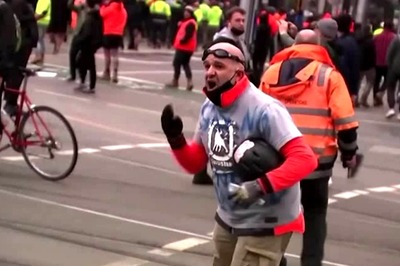 Australia's Melbourne back to the races, shops as vaccination rate hits 80%