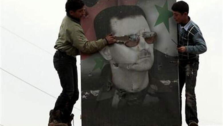 Syrian opposition chief offers Assad peaceful exit