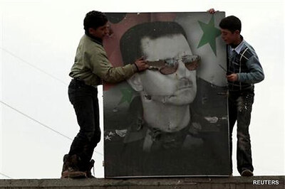 Syrian opposition chief offers Assad peaceful exit