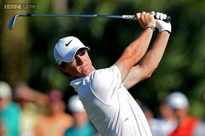 Late eagle lifts McIlroy into tie for lead at Tour Championship