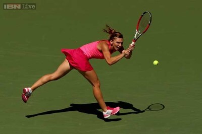 Halep rallies from behind to beat Collins in US Open 1st round