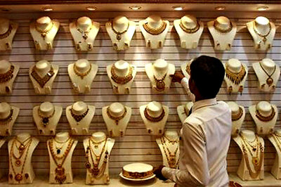 Gold prices decline to over 3-year low on global cues