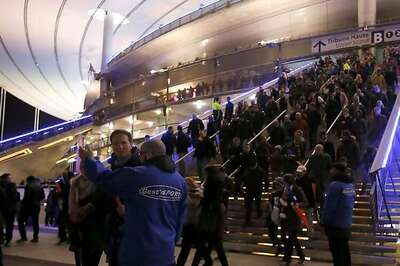 Fans stay calm amid chilling atmosphere at Stade de France