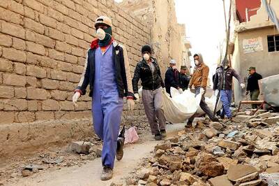 Battle Over Bodies Rages Quietly in Iraq's Mosul Long After Islamic State Defeat