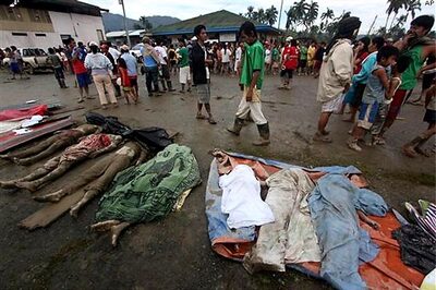 Typhoon struck Philippine begins mass burial