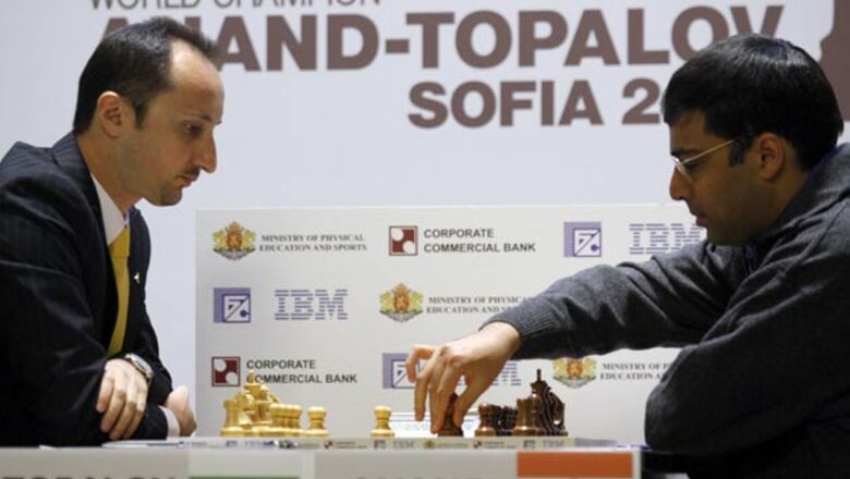 Anand draws yet again, maintains lead
