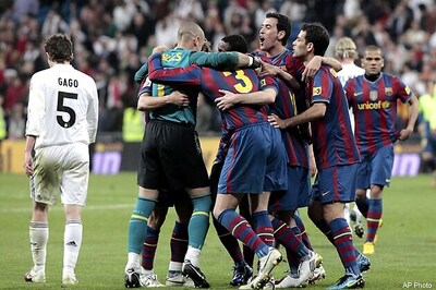 Barcelona beat Madrid 2-0, lead La Liga