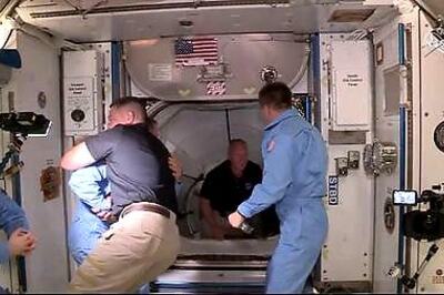 NASA Asronauts Cap Historic Odyssey Aboard SpaceX Crew Dragon Capsule