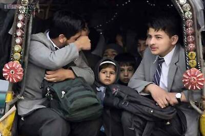 Pakistan hits back at Taliban school attackers with emotional song