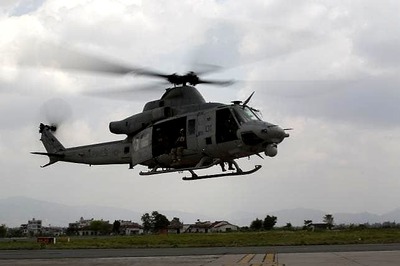 Choppers and drone hunt for missing US Huey, Nepal quake toll rises