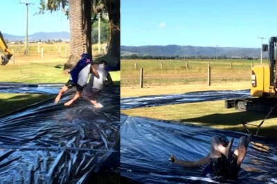 This ‘Excavator Slip And Slide’ Game Will Make You Want To Take Part
