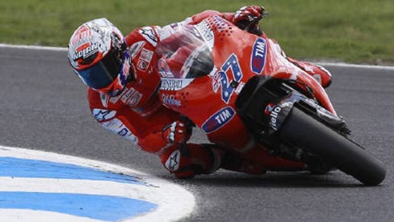 Stoner takes pole at Australian MotoGP