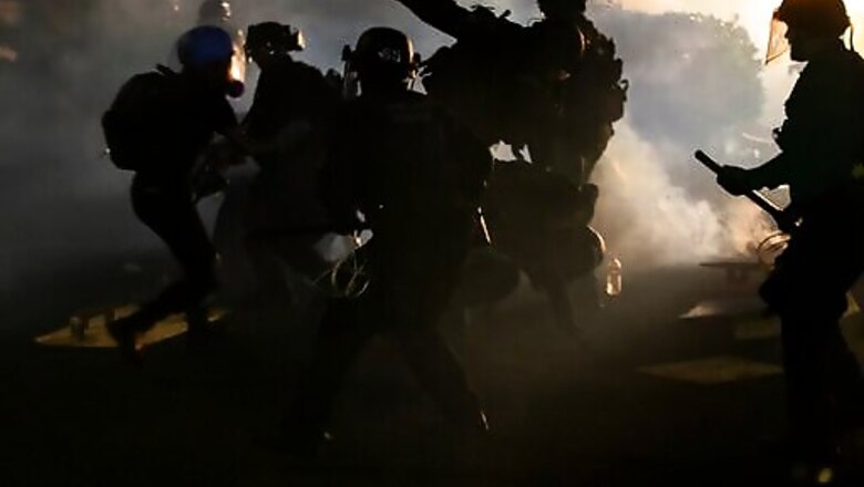 Portland protesters set fire to county government building