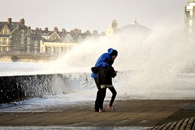 Torrential rain, wind hits flooded Britain