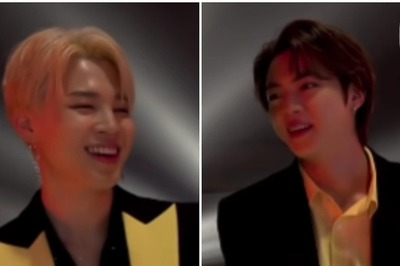 Watch: BTS Member Jin Attempts to Photobomb Jimin's Picture Session