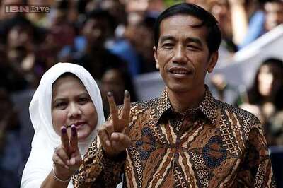 Both candidates in Indonesia election claim victory; Jokowi ahead