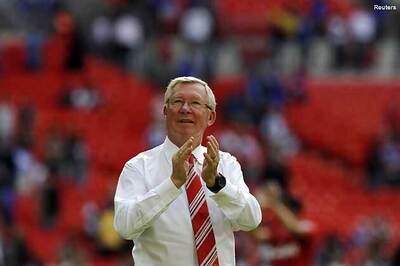 Title race between United and City, says Ferguson