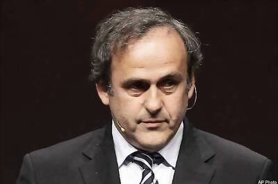 Platini says 'somebody, something' out to hurt him