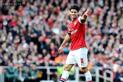 Arsenal without Arteta and Debuchy for next three months