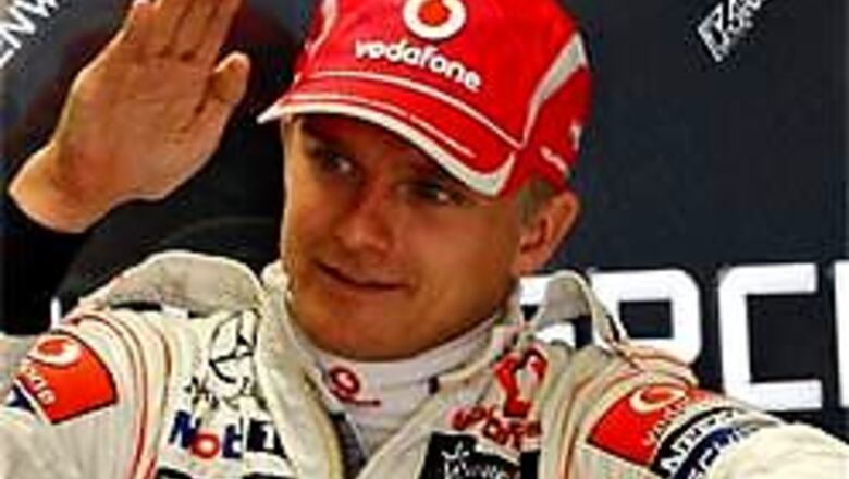 McLaren's Kovalainen takes pole at Silverstone