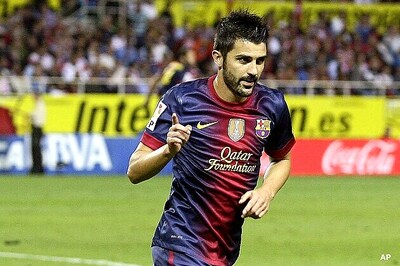 Villa's late winner lifts Barca 3-2 over Sevilla