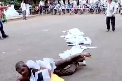 MP Man Rolls Outside Collector's Office With Garland Of Complaint Pages | Watch