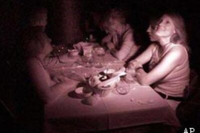 Love's blind in pitch-dark eatery