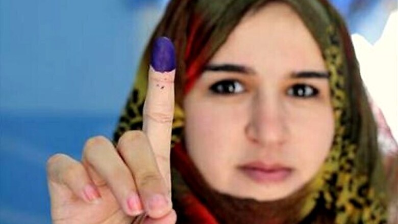 Joyful Libyans brave violence to grasp free vote