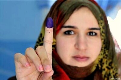 Joyful Libyans brave violence to grasp free vote