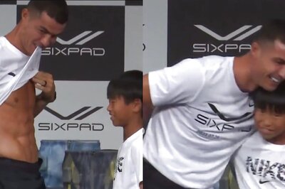 Cristiano Ronaldo Flaunts His Shredded Six-Pack Abs After Adorable Competition With Young Fan | WATCH