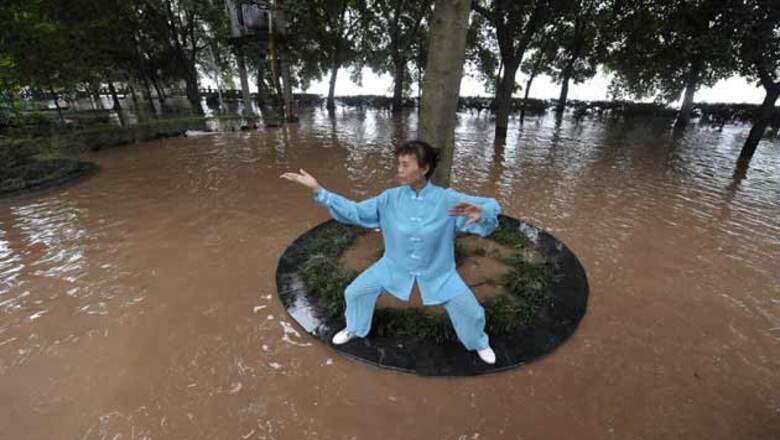 China rainstorms killed 86, thousands relocated