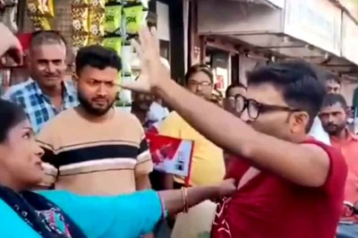 Watch: Woman Grabs Husband’s Collar And Beats Him in Public, Asks Bystanders To Record