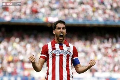 Atletico Madrid stay on course for surprise La Liga title
