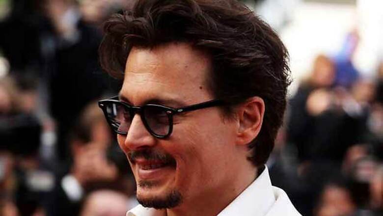 Amber Heard encourages Johnny Depp to perform with rock band The Kids